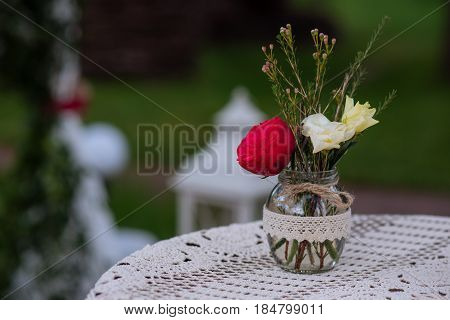 Beautiful Wedding Ceremony Outdoors. Decorated Chairs Stand On The Grass. Wedding Arch Made  Flowers