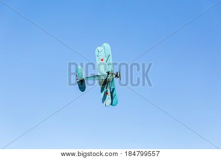 Samara Russia - April 30 2017: Retro Russian aeroplane Polikarpov PO-2 in the blue sky
