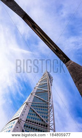 MALMO SWEDEN - MARCH 07 2017: Malmo Turning Torso in Oresund West Harbor area tallest building in Sweden and Scandinavia reaching a height of 190 metres with 54 stories and 147 apartments