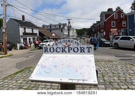 ROCKPORT, MA, USA - JUL. 25, 2015: Welcome to Rockport Sign and map on Dock Square near Bearskin Neck in downtown Rockport, Massachusetts, USA.