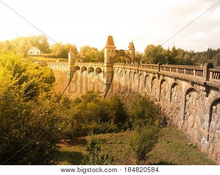 Fairytale dam Les Kralovstvi with picturesque towers on sunny summer day, Czech Republic.