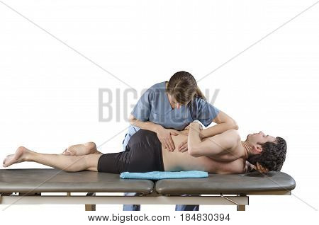 Physiotherapist Doing Manipulation To Man Patient. Osteopathy.
