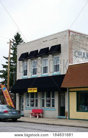 KALKASKA, MICHIGAN / UNITED STATES - NOVEMBER 27, 2016: One may have one's computer repaired at Kalkaska Computer in downtown Kalkaska.