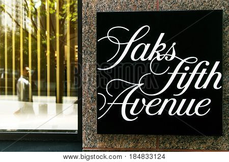 New York April 28 2017: Saks Fifth Avenue sign near the entrance to their store in downtown Manhattan.