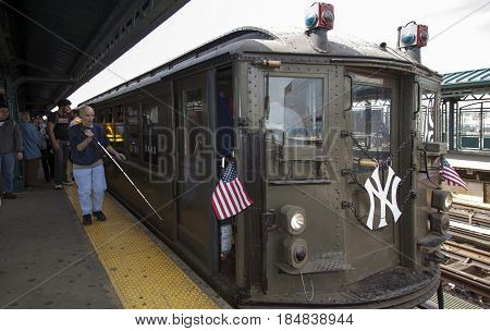 BRONX NEW YORK USA - APRIL 10: A vintage Low Voltage train from the early 1900's stops at Yankee Stadium for opening day game. Taken April 10 2017 in New York.