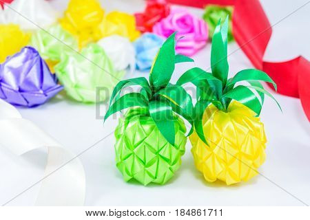 Set ribbon folded into a flower. Wrap coins by hand. for the sacred(ordination matriculation initiation) in Thailand on white background