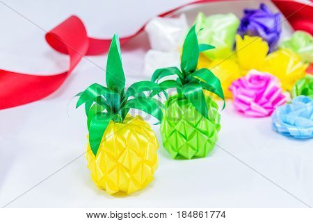 Set ribbon folded into a flower. Wrap coins by hand. for the sacred(ordination matriculation initiation) in Thailand on white background