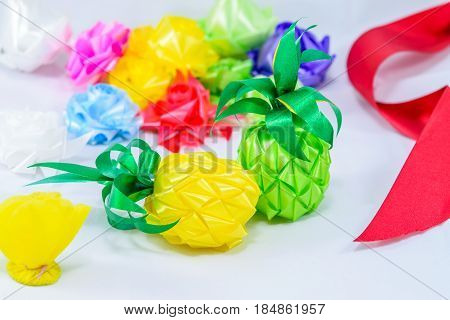 Set ribbon folded into a flower. Wrap coins by hand. for the sacred(ordination matriculation initiation) in Thailand on white background