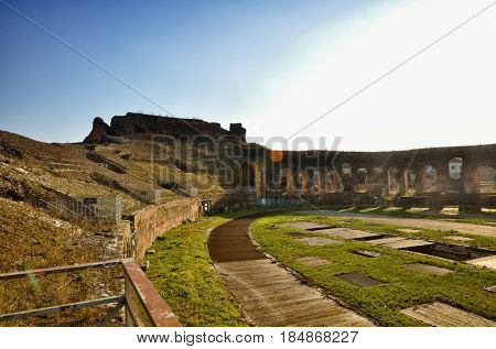 The Amphitheater of Santa Maria Capua Vetere, the second biggest roman amphitheater, tourist destination for cultural trips to Italy