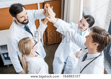 Doctors Team Giving Highfive