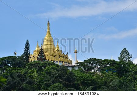 Golden pagoda famous places land mark in mangla shan state myanmar. Nearly china ishuangbanna SibsongbannaSipsong Panna