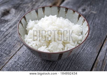 Traditional Japanese Koshihikari Rice as close-up in a bowl