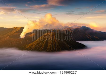 Mount Bromo volcano (Gunung Bromo) during sunrise from viewpoint on Mount Penanjakan. Mount Bromo located in Bromo Tengger Semeru National Park East Java Indonesia bromo mount. Mount Bromo  indonesia. Mount Bromo landscape