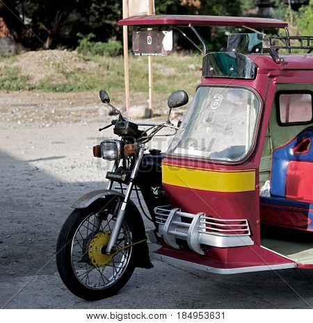 In Asia Philipphines The Typical  Motorbike