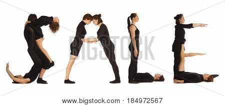 Black dressed people forming word SALE on white background