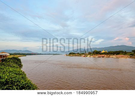 Natural landscape of Mekong River is a muddy color during sunset at Golden Triangle Park (Sob Ruak) is the border between Thailand Laos and Myanmar in Chiang Rai Province Thailand