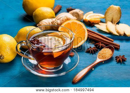 Cup Of Ginger Tea With Lemon And Honey On Dark Blue Background,