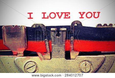 Text By Typewriter I Love You With Red Ink With Vintage Toned Effect
