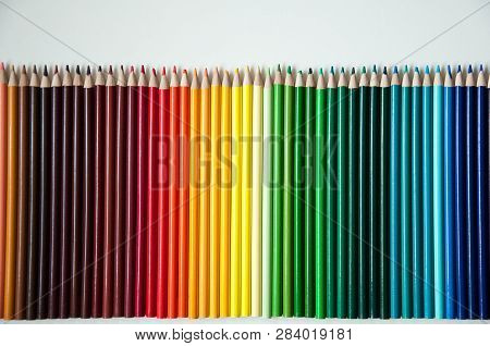 Many Multi-colored Pencils.
Background With Color Pencils. Rainbow Colors, Palette. Bright And Color