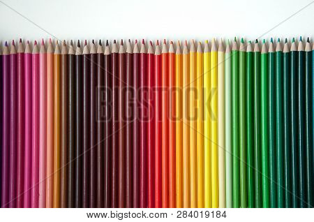 Many Multi-colored Pencils.
Background With Color Pencils. Rainbow Colors, Palette. Bright And Color