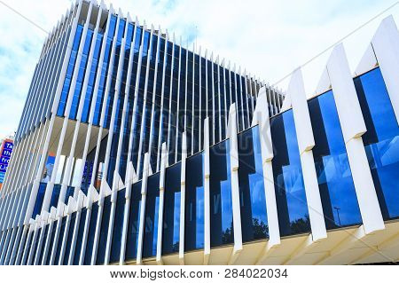 Lisbon - July 25, 2018:  View Of The Vertical Structural Blades And Blue Mirror Glass Facade Of Mode