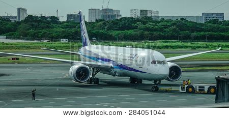 Passenger Airplane At Manila Airport, Philippines