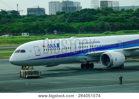 Passenger Airplane At Manila Airport, Philippines