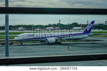 Passenger Airplane At Manila Airport, Philippines