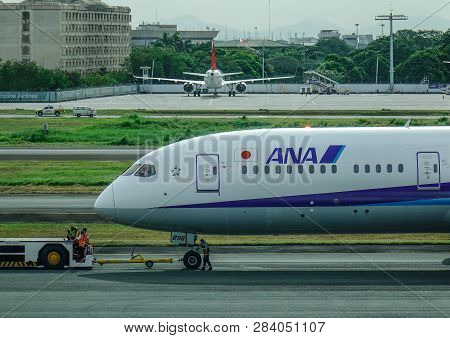 Passenger Airplane At Manila Airport, Philippines