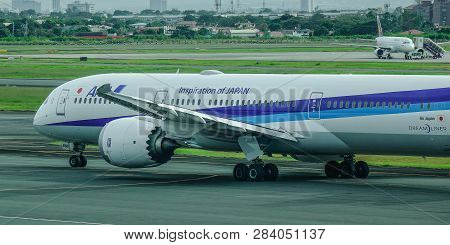 Passenger Airplane At Manila Airport, Philippines