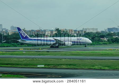 Passenger Airplane At Manila Airport, Philippines