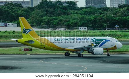 Passenger Airplane At Manila Airport, Philippines