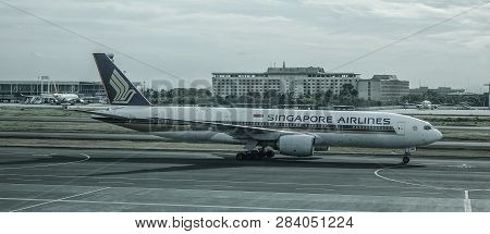 Manila, Philippines - Dec 4, 2018. A Boeing 777-200er Airplane Of Singapore Airlines Taxiing On Runw