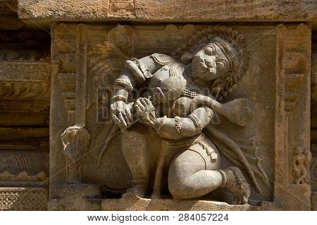 Statue Of Man Playing Bean, Wind Instrument, On Stone Pillar At Rayara Gopura In Melukote, Mandya Di