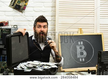 Beyond His Wildest Imagination. Bearded Hipster With Bitcoin Symbol And Dollars. Business Man In Ser