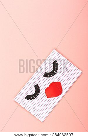 Creative Love Or Valentine Day Background Made With Cute Envelope. Eye Lashes And Red Lips Looklike 