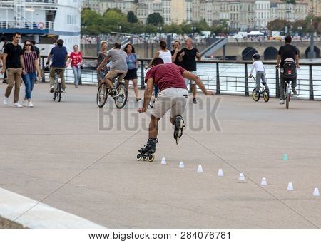 Bordeaux, France - September 9, 2018: Roller Skater Performs Acrobatics In Quai Lousi Xviii In Borde