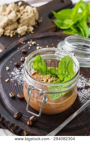 Vegan Chocolate Mousse With Halvah And Fresh Mint In A Jar For Dessert..