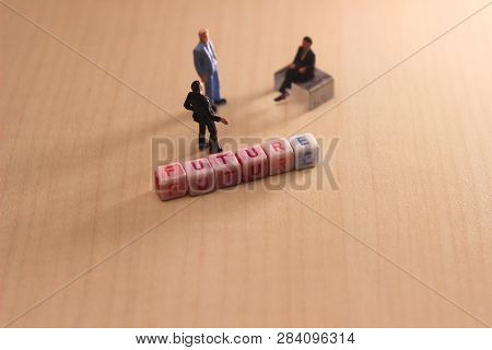 Top View Mini Figure Toy Two Businessman Talking About Their Future Organization Or Corporate