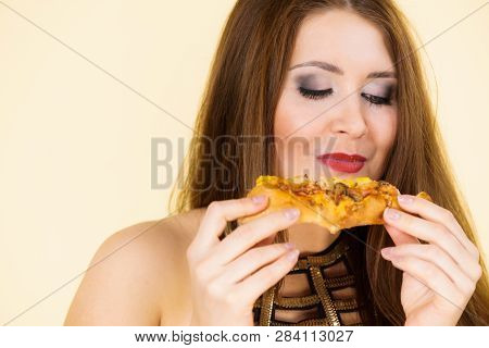 Young Woman Eating Hot Fresh Pizza Slice. Delicious Fast Food Meal. People, Italian Cuisine Concept.
