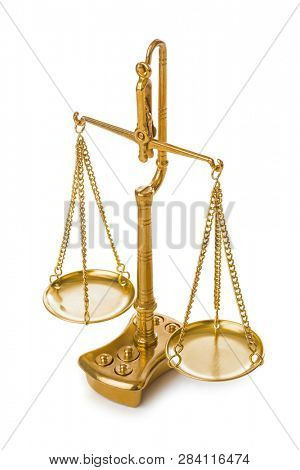 Golden weight balance scale isolated on white background