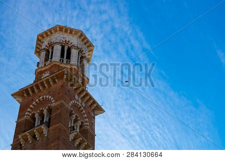 Torre Dei Lamberti In Verona With The Blue Sky Background