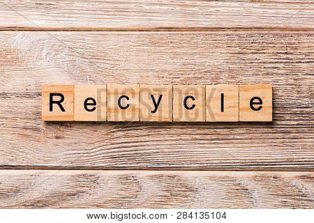 Recycle Word Written On Wood Block. Recycle Text On Wooden Table For Your Desing, Concept