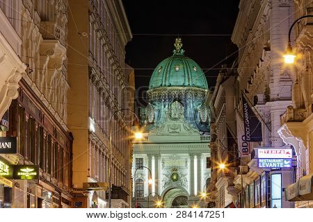 VIENNA, AUSTRIA - JULY 12, 2015: Kohlmarkt street with Hofburg Complex in downtown of Vienna in Austria