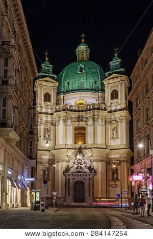 VIENNA, AUSTRIA - JULY 12, 2015: Kohlmarkt street with Hofburg Complex in downtown of Vienna in Austria