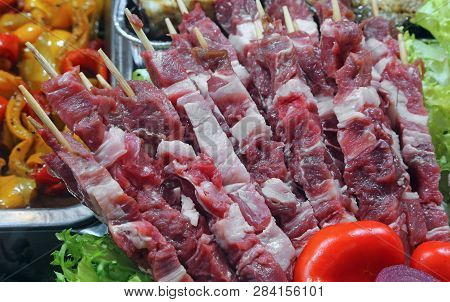 Many Small Skewers Of Mutton Called Arrosticini In Italian Language For Sale In The Deli Shop
