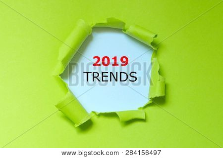 Ufo Green Torn Paper With Word 2019 Trends.