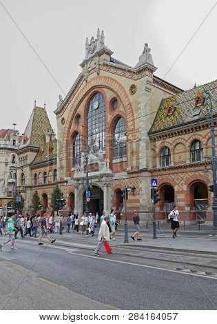 Budapest, Hungary - July 13, 2015: Shoppers In Front Of Central Market Hall At Fovam Square In Budap