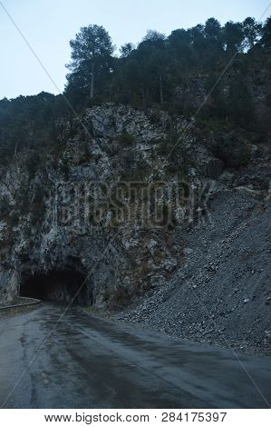 Road In A Tunnel Caught In The Rock Of A Gorge That Surrounds The Plandescun Reservoir A Rainy Day I