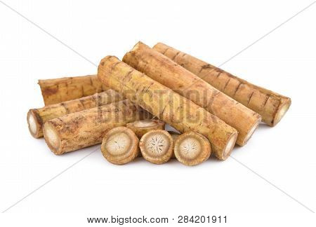 Fresh Burdock Root Or Gobo Stick And Sliced On White Background